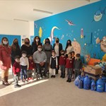 a group of people standing in a room