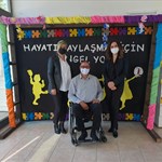 a group of people posing for the camera